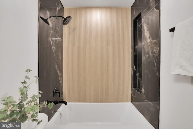 bathroom featuring bathing tub / shower combination