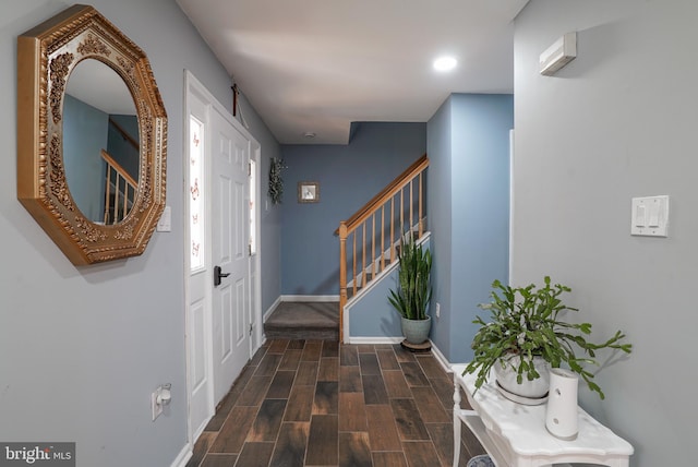 foyer featuring dark wood-type flooring