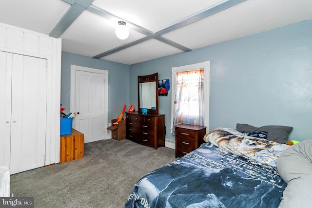 bedroom with carpet flooring and a baseboard radiator