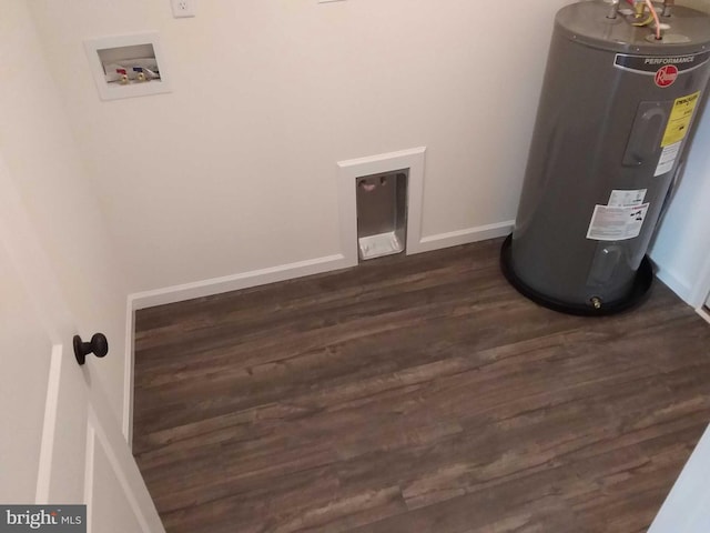 utility room featuring water heater