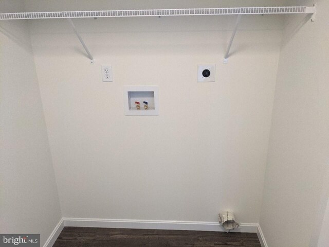 washroom with electric dryer hookup, dark wood-type flooring, and washer hookup