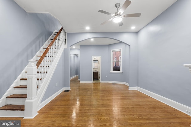 interior space with hardwood / wood-style flooring and ceiling fan