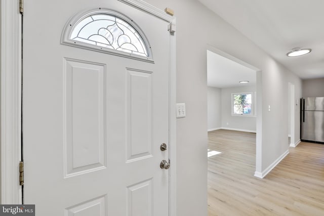 entrance foyer with light wood-type flooring