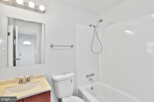 full bathroom with toilet, vanity, and bathtub / shower combination