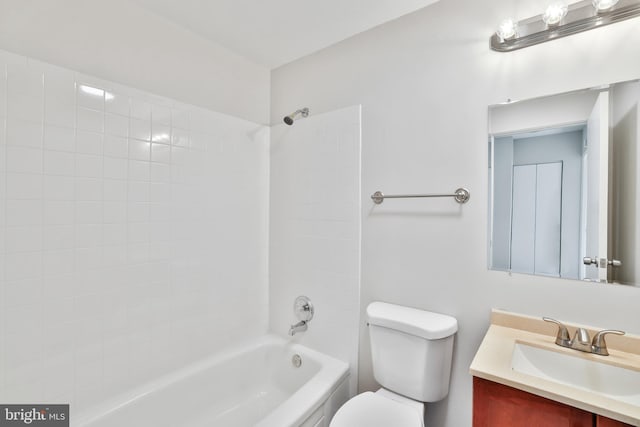 full bathroom featuring shower / tub combination, vanity, and toilet