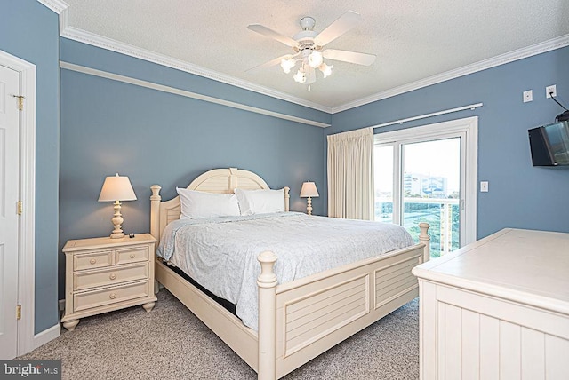 bedroom featuring crown molding, a textured ceiling, carpet, and ceiling fan