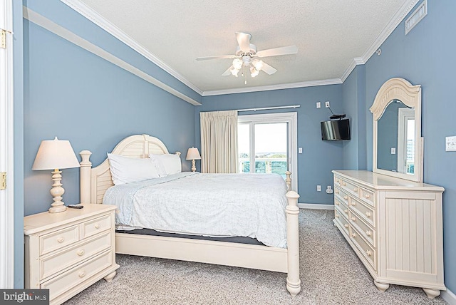 carpeted bedroom featuring access to outside, ornamental molding, a textured ceiling, and ceiling fan