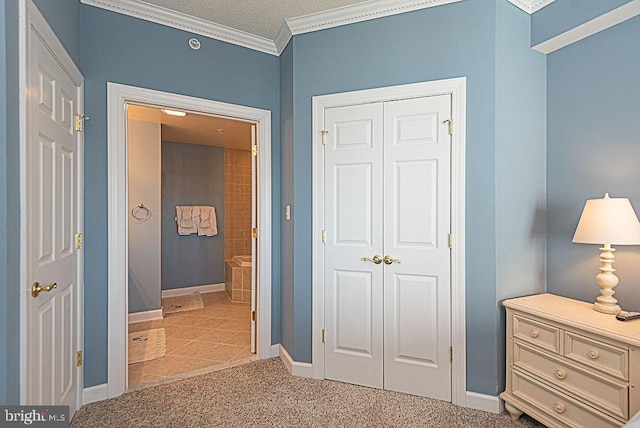 interior space with ornamental molding, a textured ceiling, and light carpet