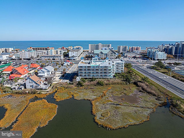 drone / aerial view with a water view