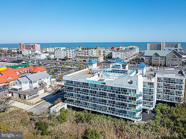 drone / aerial view featuring a water view