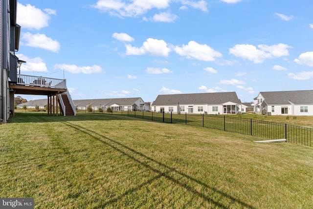 view of yard with a wooden deck