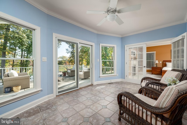 interior space featuring french doors, ceiling fan, and a wealth of natural light