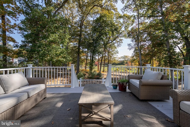 view of patio featuring a wooden deck and outdoor lounge area