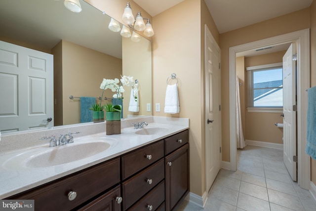 bathroom featuring vanity and tile patterned floors