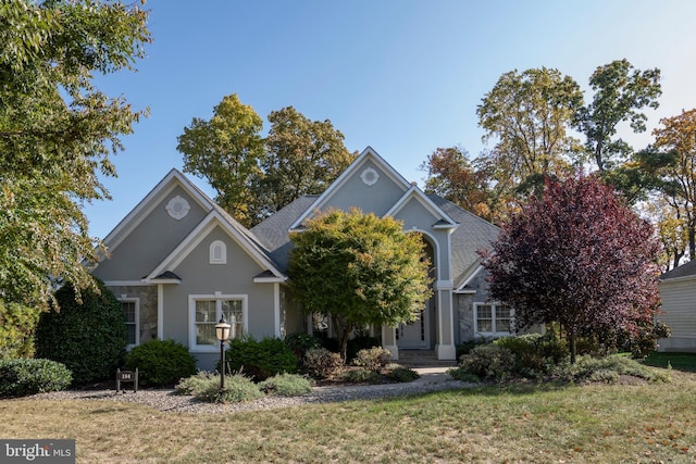 view of front of house with a front lawn