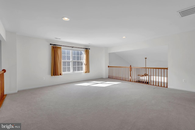 unfurnished room with carpet floors