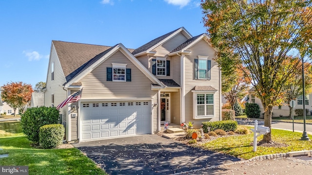 front of property featuring a garage