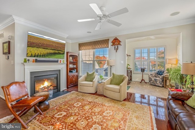 living room with ornamental molding and a wealth of natural light