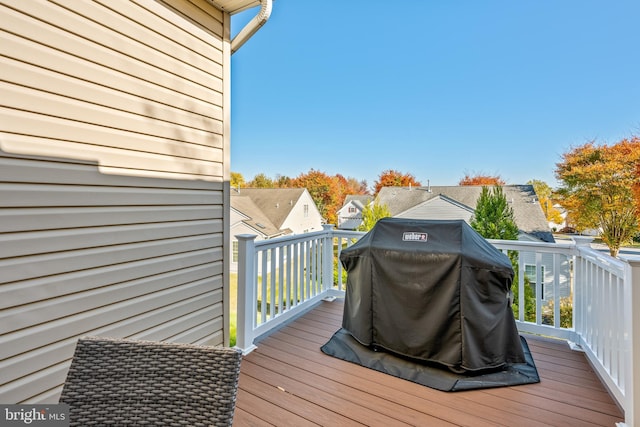 wooden deck with grilling area