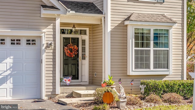 entrance to property with a garage