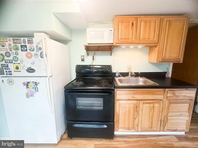 kitchen featuring white appliances, sink, and light wood-type flooring