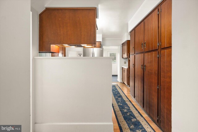 hall featuring light wood-type flooring