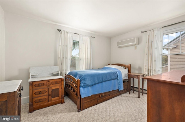 bedroom featuring a baseboard radiator, a wall mounted AC, and light colored carpet