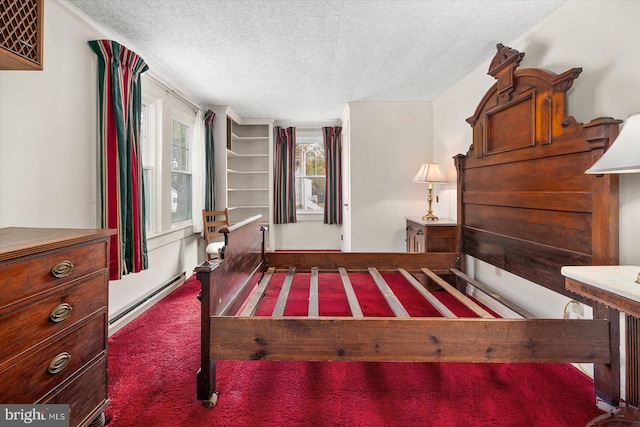 bedroom with a textured ceiling, baseboard heating, and dark carpet