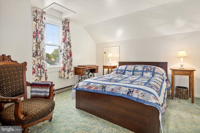 carpeted bedroom with baseboard heating and vaulted ceiling