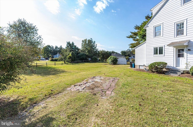 view of yard featuring fence