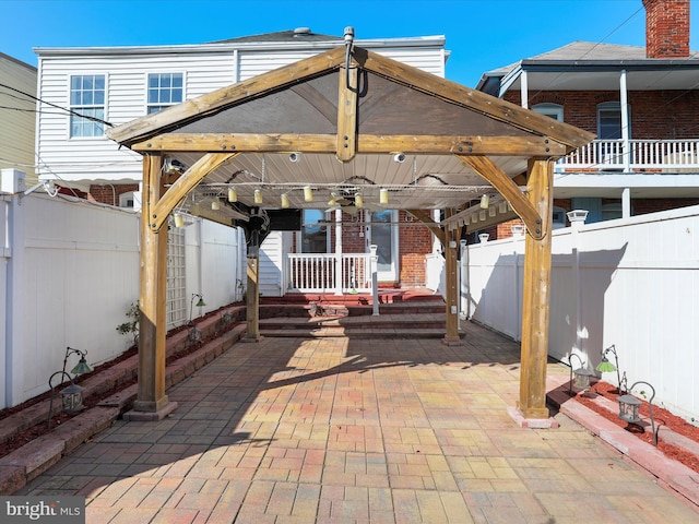 view of patio featuring ceiling fan