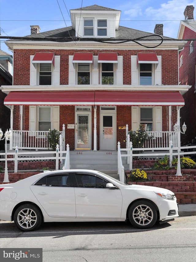 view of front of home featuring covered porch