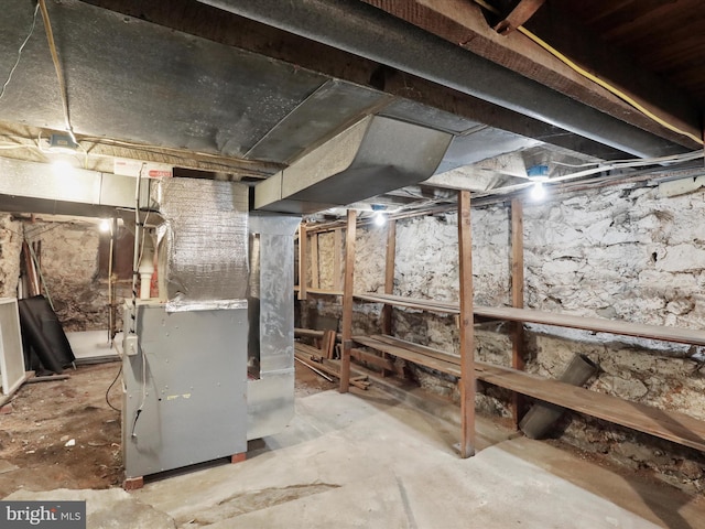 basement with heating unit