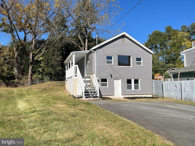 exterior space featuring a front lawn