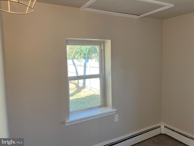 interior space with carpet flooring and a baseboard radiator