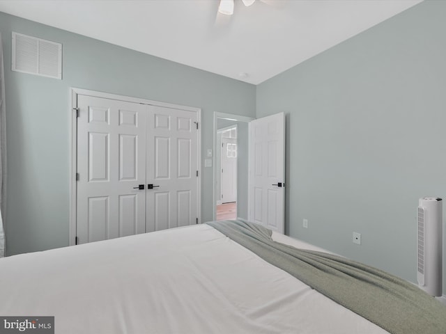 bedroom with a closet and ceiling fan