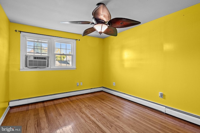 empty room with ceiling fan, cooling unit, light hardwood / wood-style flooring, and baseboard heating