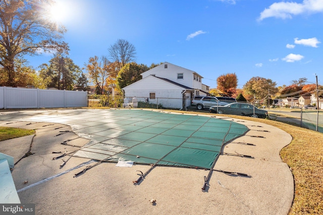 view of swimming pool with a patio area