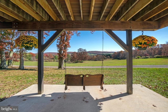 view of patio with a rural view