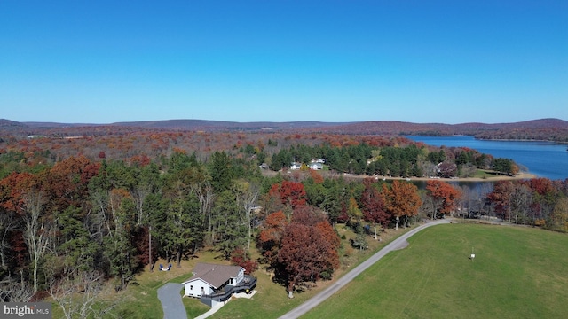 aerial view featuring a water and mountain view