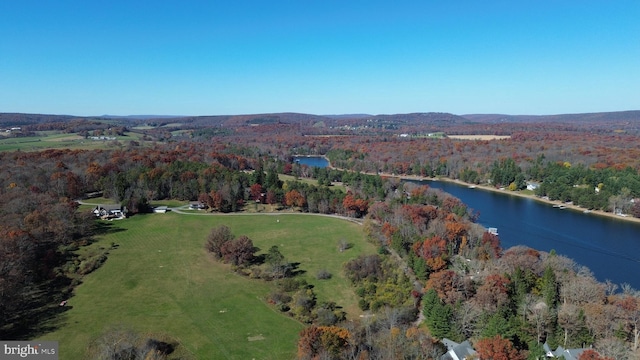 drone / aerial view featuring a water view