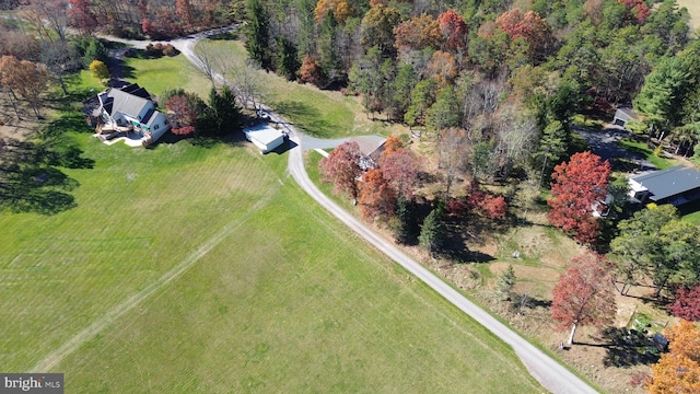 birds eye view of property featuring a rural view