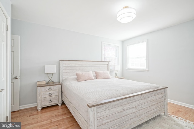 bedroom featuring light hardwood / wood-style floors