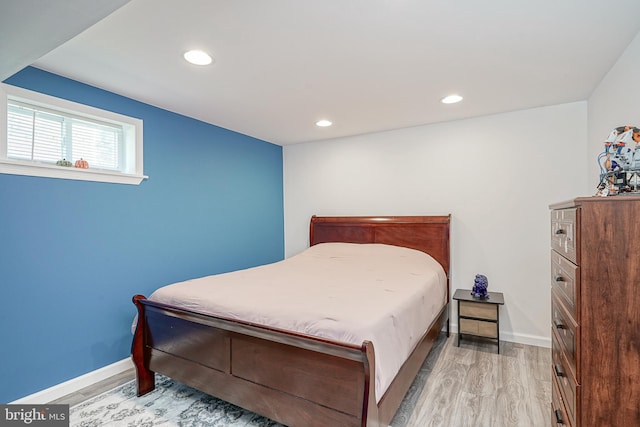 bedroom featuring wood-type flooring