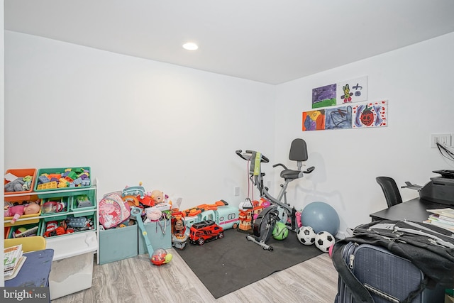 game room featuring hardwood / wood-style flooring