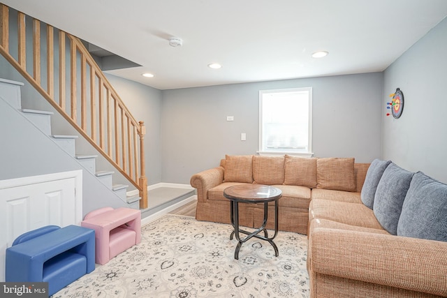 living room with light hardwood / wood-style flooring