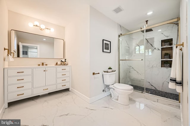 bathroom featuring vanity, toilet, and an enclosed shower