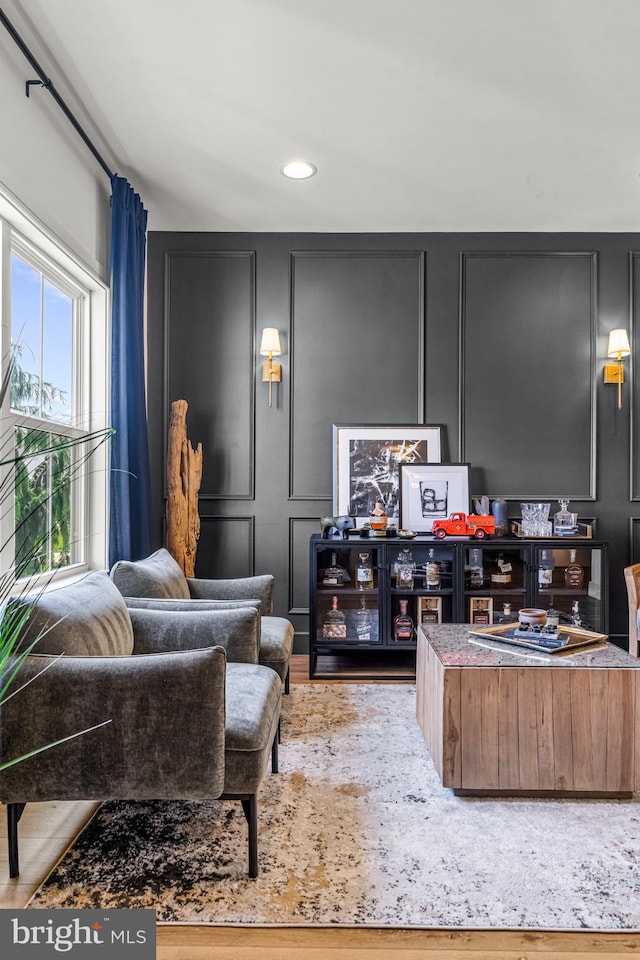 living room with light hardwood / wood-style flooring