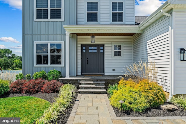 property entrance with a porch