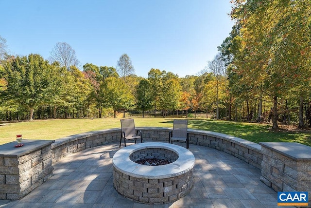 view of patio / terrace with a fire pit